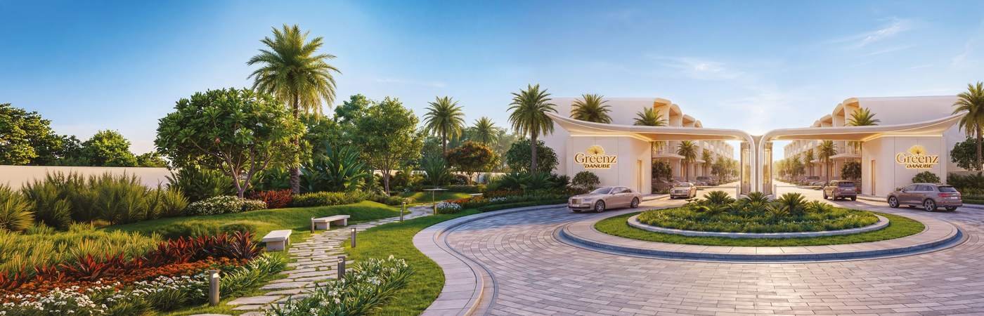 Entrance gate and landscaped garden at Greenz by Danube